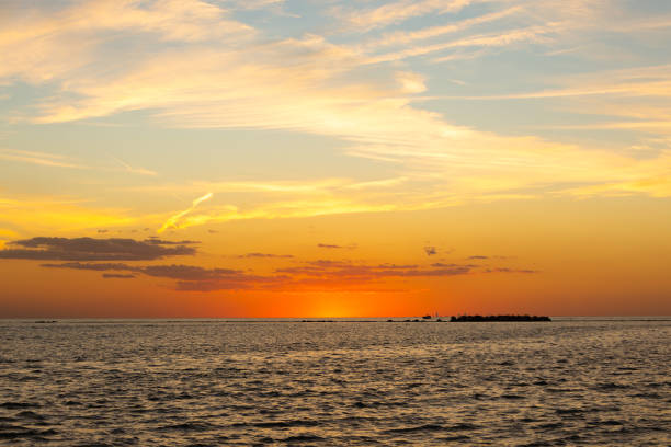 Sun setting on Lake Michigan.  Michigan City, Indiana, USA