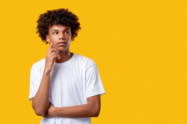 pensive black teenager make decision guy