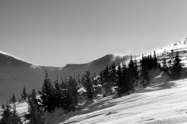 istock Winter mountains at sun windy day 1297688794