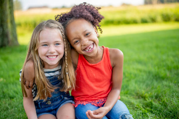 istock Best friends outside together in the summertime 1297688901