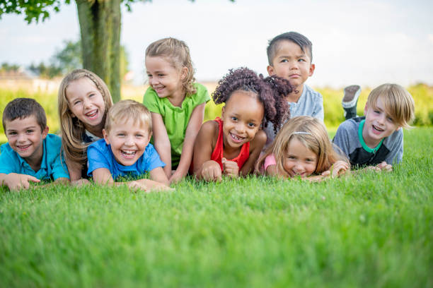 istock Kindergarteners outside in the summertime 1297688902