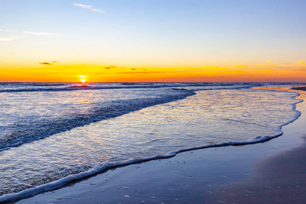 Daytona Beach sunrise in Florida, USA Daytona Beach sunrise in Florida, USA daytona beach stock pictures, royalty-free photos & images