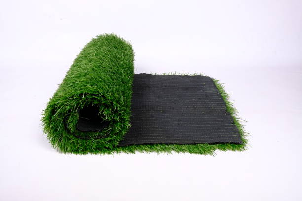 istock artificial turf for sports and playgrounds,lawn roll isolated on white background 1297691628