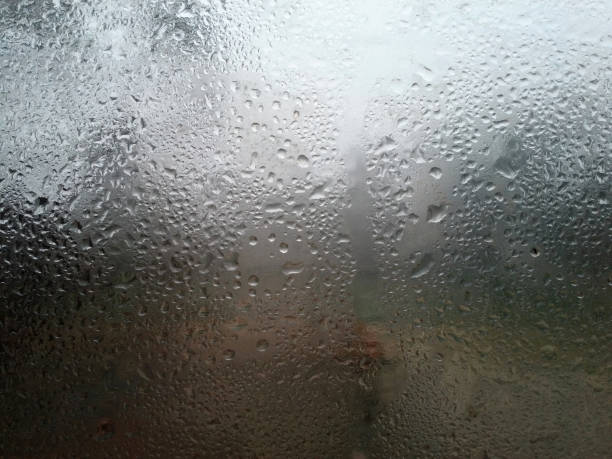 istock Dew drows on window glass in the winter morning 1297696143