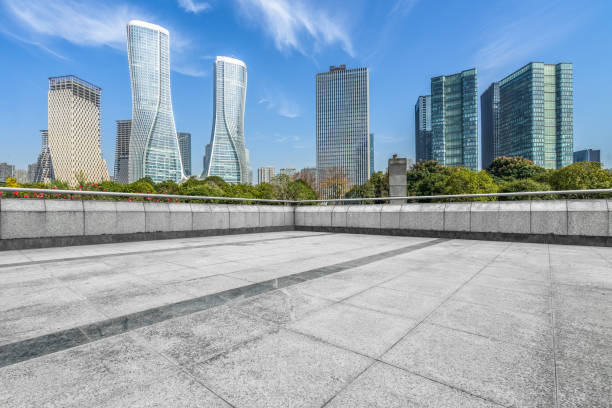istock empty pavement and modern buildings in city 1297696173