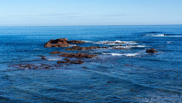 istock Rocks in the middle of sea 1297698183