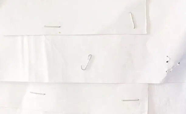 staple wires on white paper texture, white paper with staple wire background