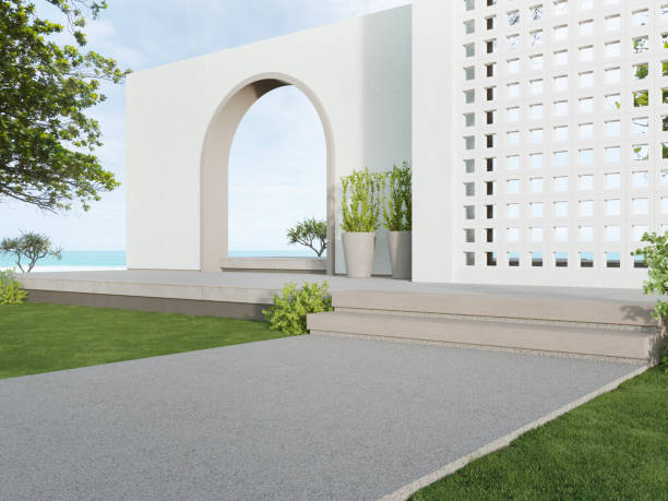 istock White ventilation block wall and empty concrete walkway with sea view. 1297708032