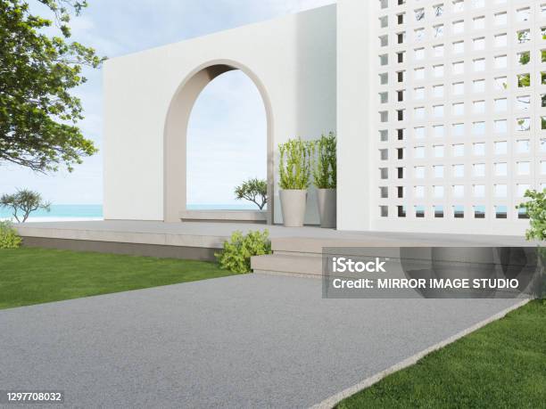 White Ventilation Block Wall And Empty Concrete Walkway With Sea View Stock Photo - Download Image Now