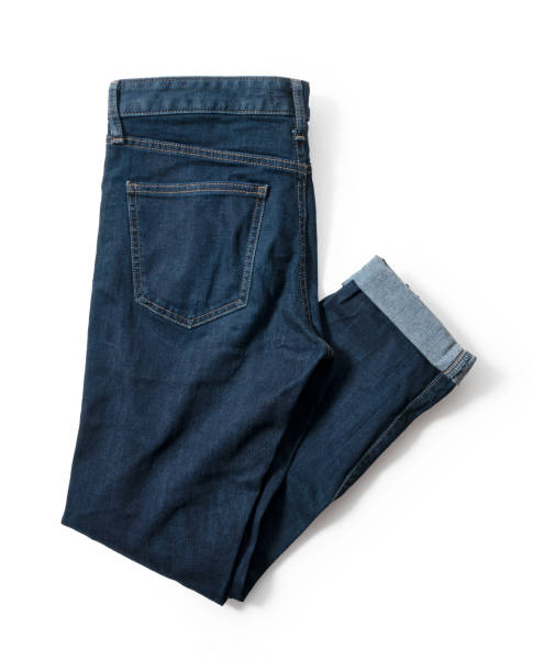 istock Blue jeans on a white background. View from above 1297709676