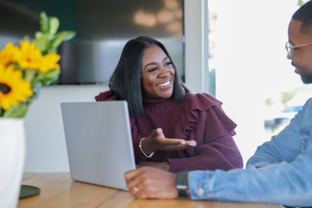 istock Professional looking woman using her hands to gesture while explaining her point of view 1297711885