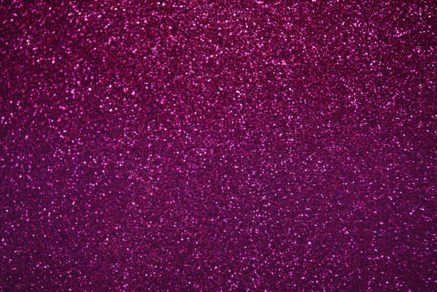 istock Pink and Purple Glitter Background 1297718061