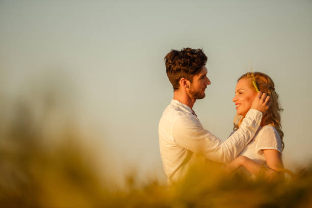 istock Man decorating her head with a wheat plant 1297718298