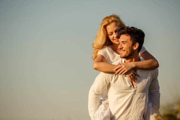 istock Piggyback of love 1297718900