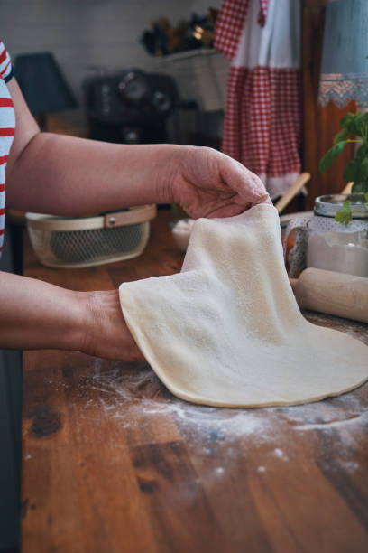 istock Preparing Vegan Pizza with Chickpeas and Avocado 1297719928