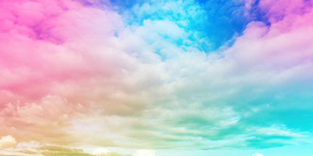 istock Abstract blurred beautiful soft cloud background. Pastel swirl multicolored gradient. concept for wedding card design or presentation 1297725575