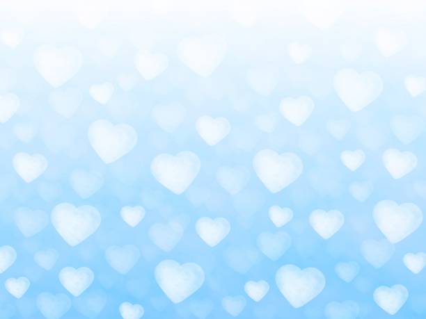 istock Illustration of a group of white hearts on a blue background 1297729515