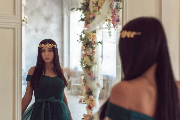 istock Pretty brunette in a long dress 1297730067