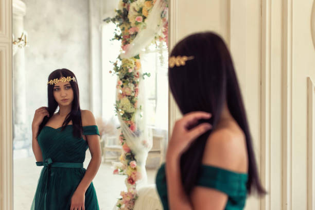 istock Pretty brunette in a long dress 1297730118