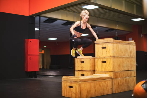 istock Woman athlete in Gym 1297730260