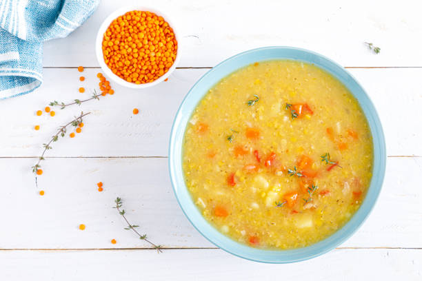 istock Corba. Vegan turkish red lentil thyme soup. Top view 1297731309