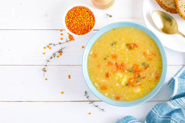 istock Corba. Vegan turkish red lentil thyme soup. Top view 1297731310