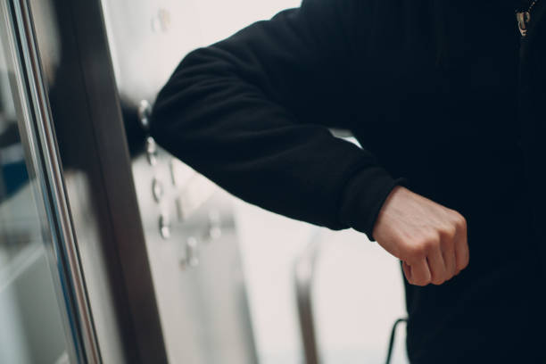 istock Close up of elbow pressing the button elevator during coronavirus pandemic covid-19 quarantine concept 1297731368