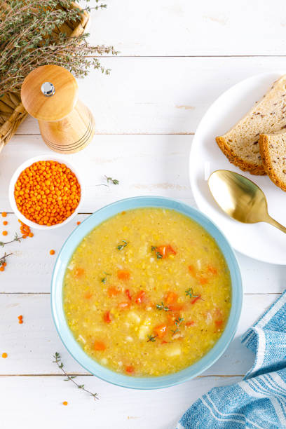 istock Corba. Vegan turkish red lentil thyme soup. Top view 1297731393