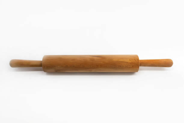 istock On a white background in the center is a cylindrical rolling pin for rolling dough 1297735103