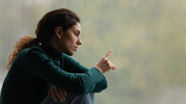 istock Unhappy woman feel lonely alone in home 1297735531