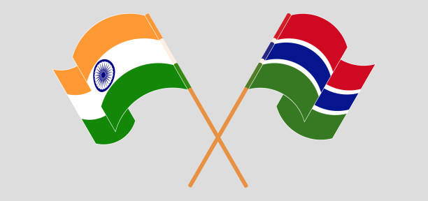 istock Crossed flags of India and the Gambia 1297737888