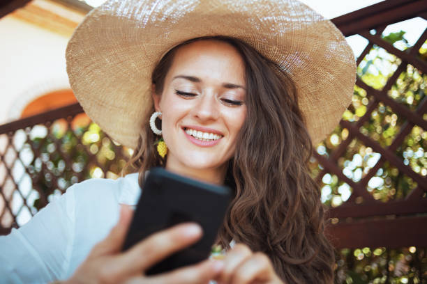 istock happy woman in shirt using video chat 1297738716