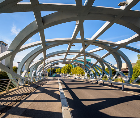 Geneva, Switzerland - September 10, 2020: The Hans Wilsdorf bridge, after the name of the founder of Rolex, was built in 2012 on the Arve river, close to the headquarters of the brand.