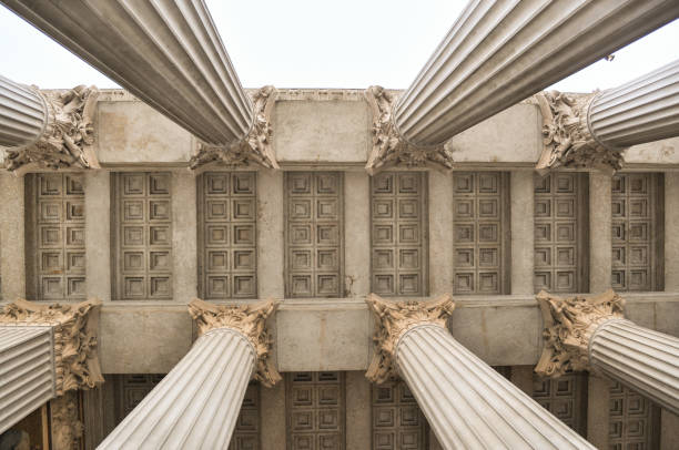 istock Ancient style of architecture. Ceiling and pillars. Minimal creative co position. 1297741229
