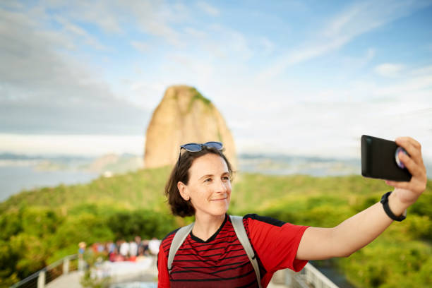 istock Woman traveler taking selfies 1297742198