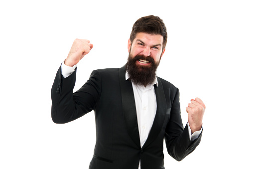 Release your inner winner and win. Happy winner isolated on white. Bearded man shout making winner gesture. Excited winner celebrate victory. Success in business. Successful applicant.
