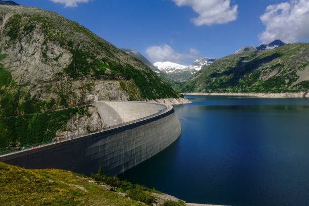 istock hydroelectric power plant with a huge dam with blue water in the mountains 1297747607