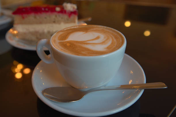 istock Cappuccino and vegan cake 1297747826