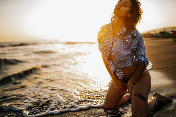 istock Woman in sea shallow 1297747971