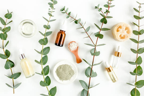 istock Eucalyptus essential oil, eucalyptus leaves on white background. Natural, Organic cosmetics products. Medicinal, Natural Serums. Flat lay, top view 1297748827