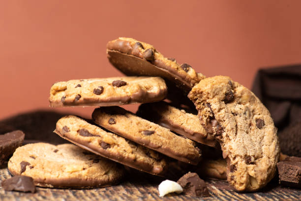 istock Chocolate chip cookies on a pile closeup 1297752365