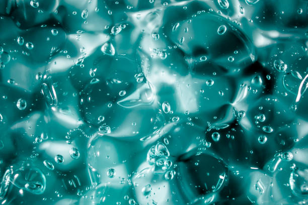 istock Liquid cream gel, green blue cosmetic texture with bubbles 1297753269