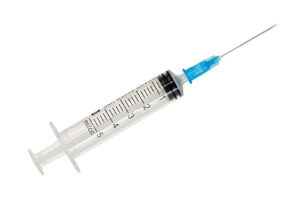 istock Empty plastic syringe medical isolated on white background. 1297754565
