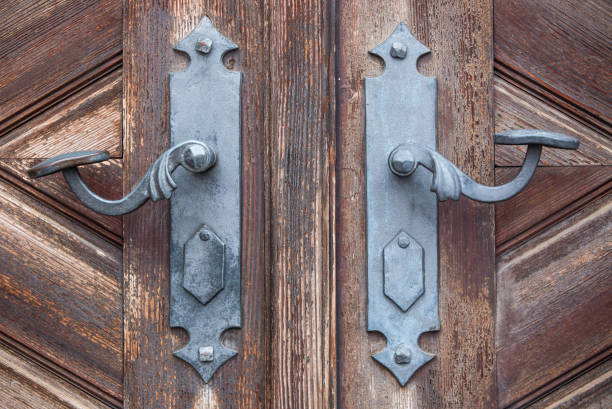 istock Old historical wood door as a background or texture 1297754719