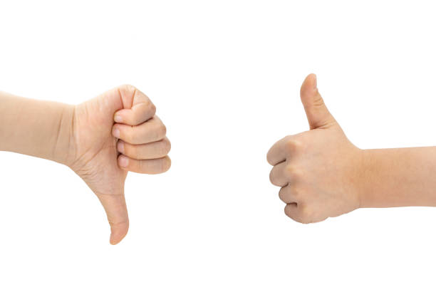 istock White background indicates victory and defeat gestures 1297754947
