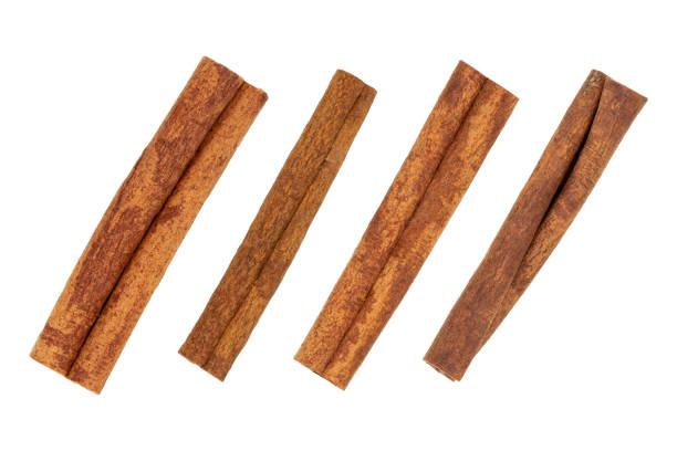 istock Cinnamon sticks isolated on white background without shadow, top view 1297756278