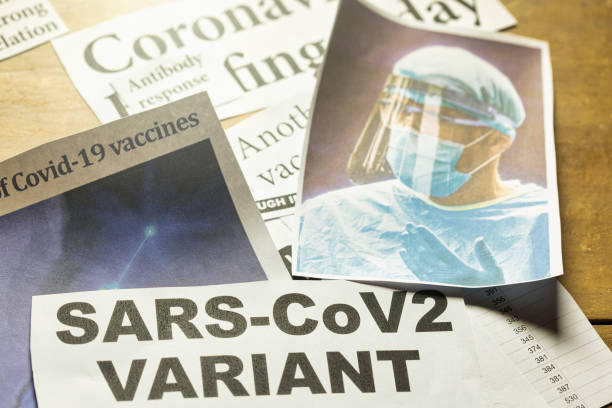 istock Newspaper headlines about COVID-19 pandemic 1297758167