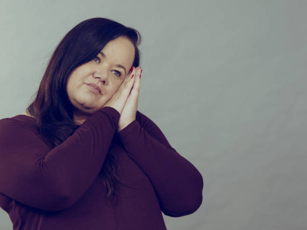 istock Woman being sleepy gesturing 1297758260
