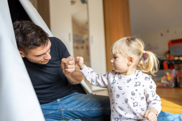 istock Father having fun in kid's room 1297758576