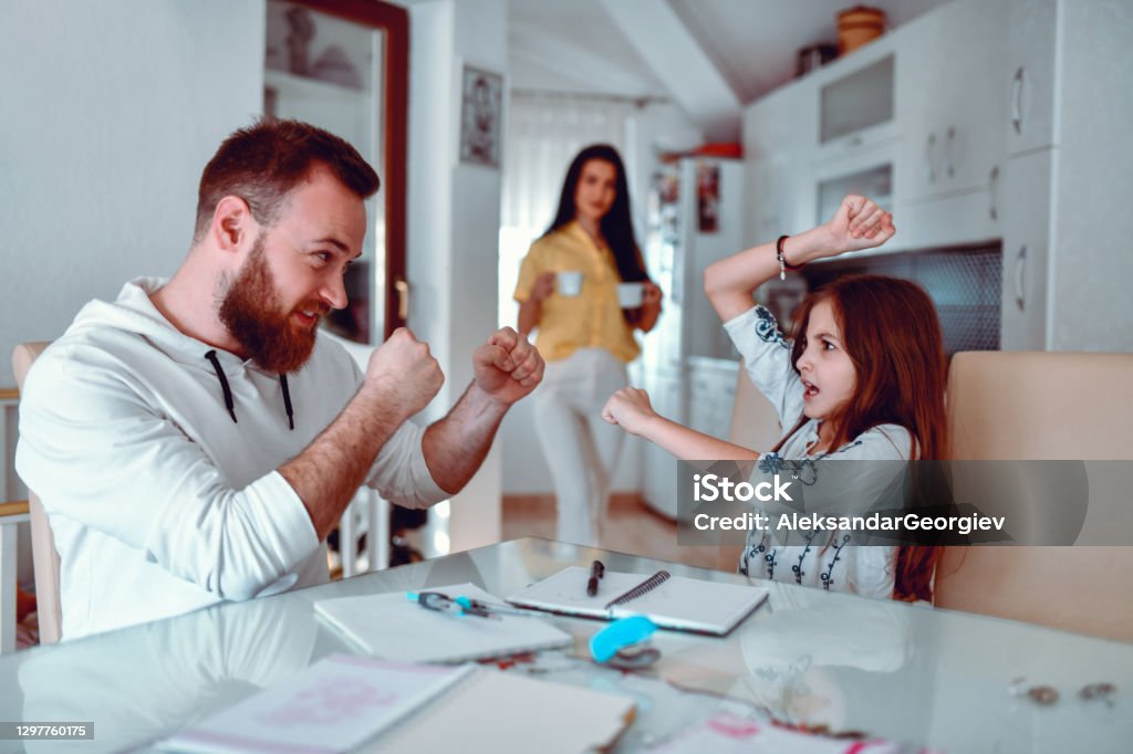 Father Playfully Staging Boxing Fight With Child Daughter Boxing - Sport Stock Photo